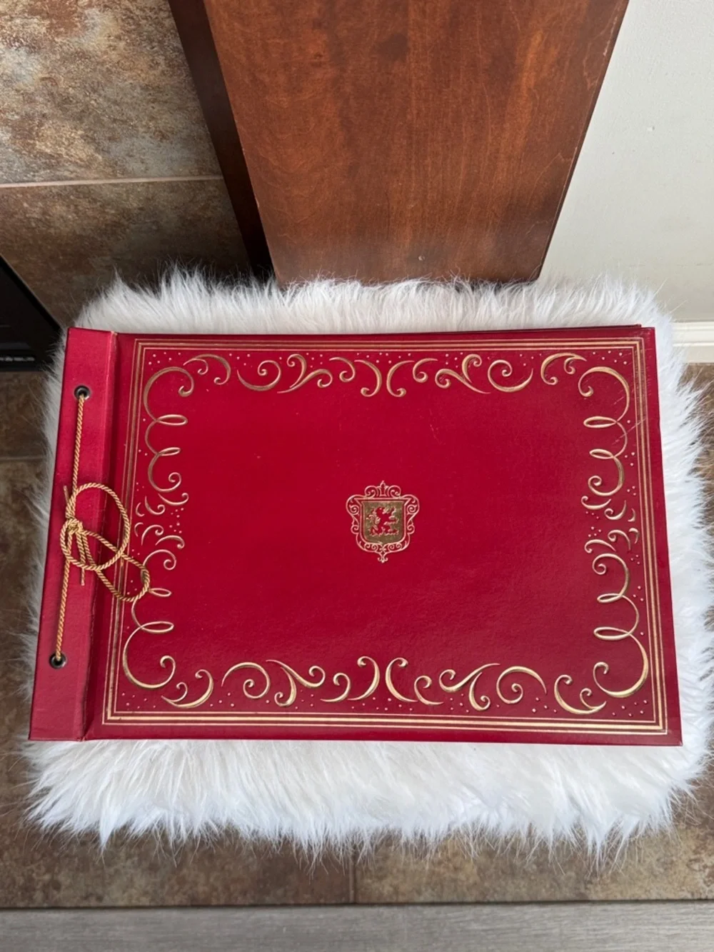 Vintage red scrapbook gold embossed scrollwork royal crest regal unused 15x10”